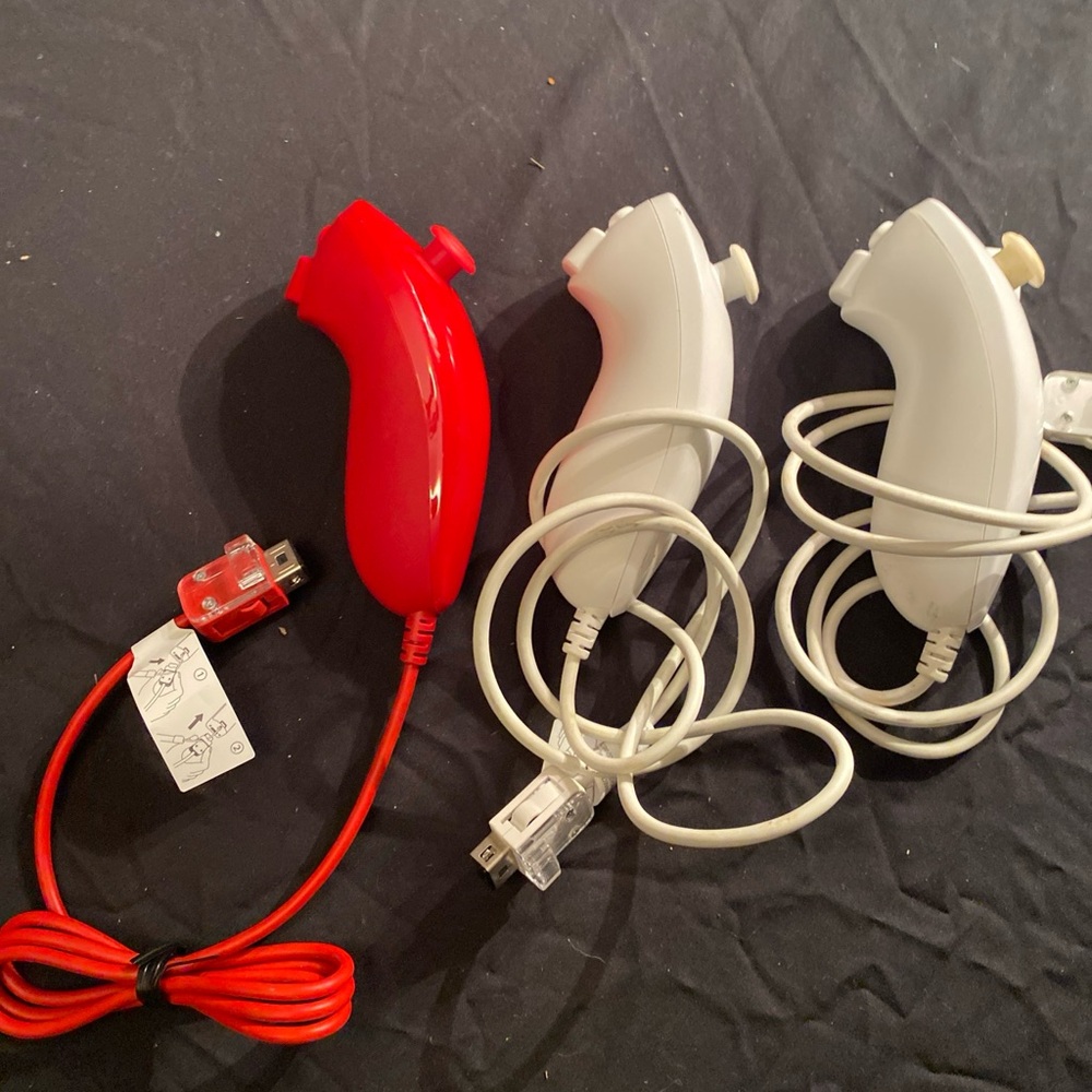 Nintendo Red and White Motion Nunchuk Controllers